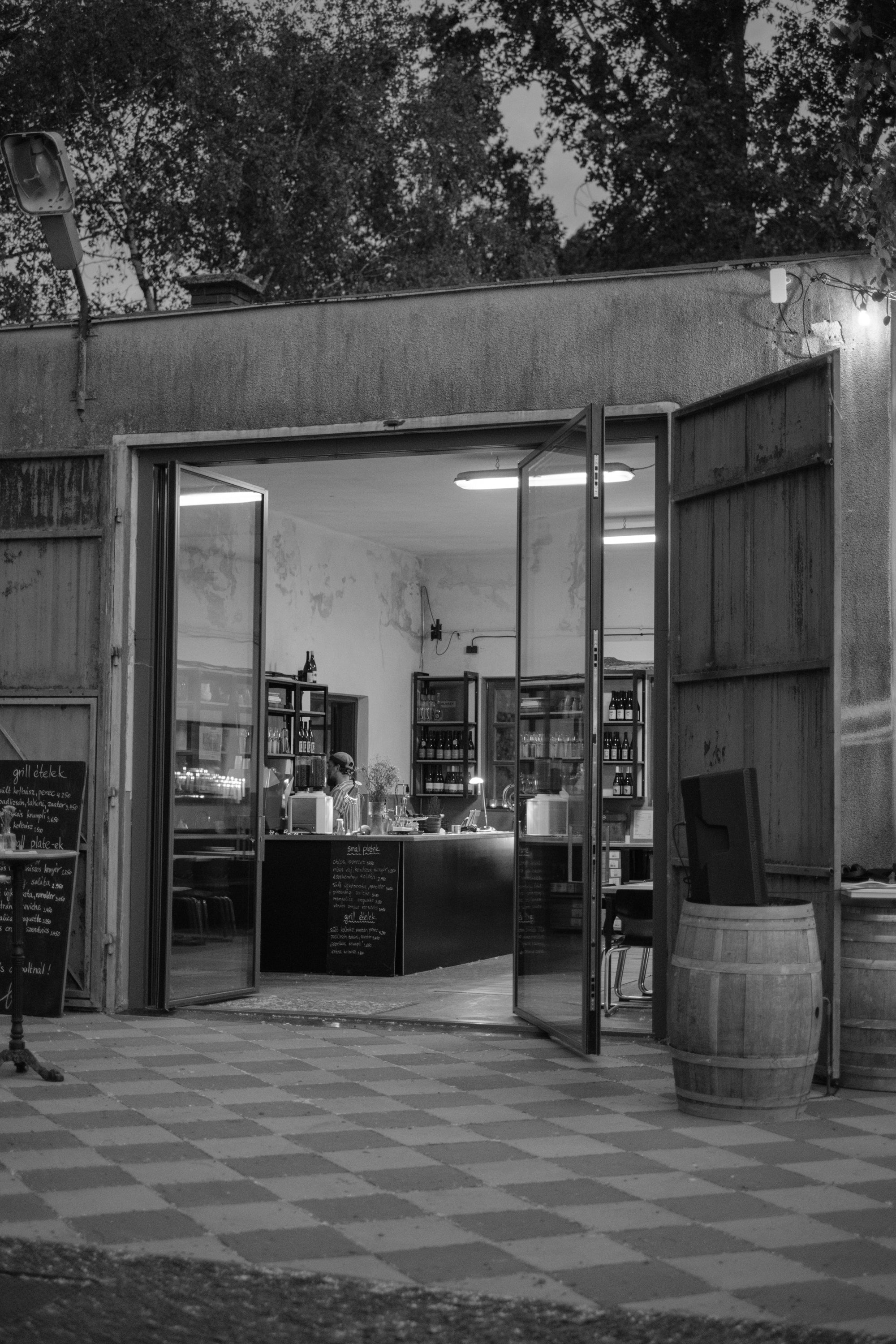 Gilvesy b-uzem, organic wine bar and shop building, from outside looking in.